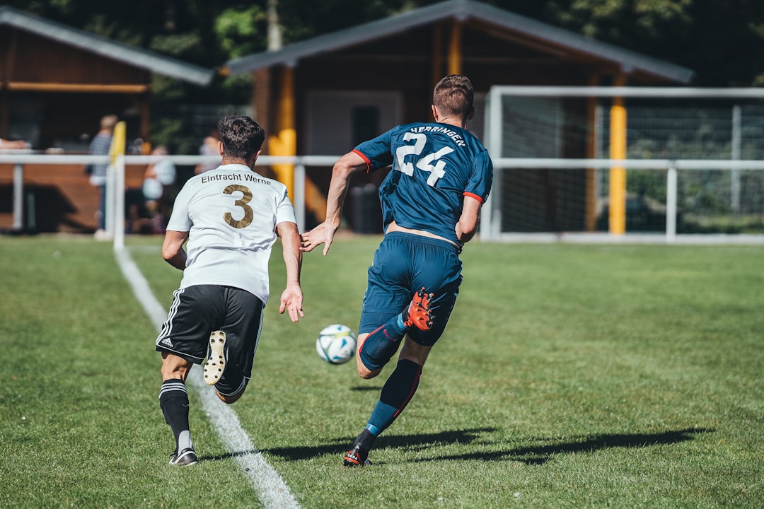 gallery-4 2-men-playing-soccer-on-green-grass-field-during-daytime-wdqz3rbcogq