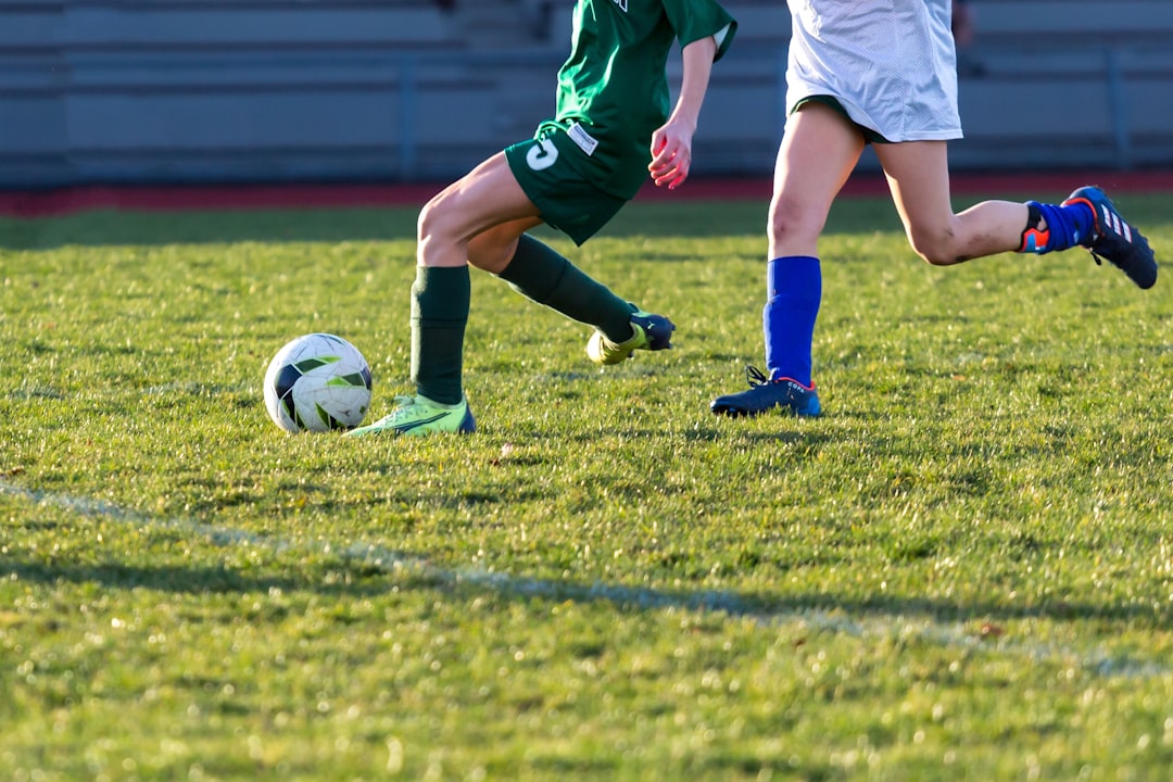 our-experience a-couple-of-kids-playing-a-game-of-soccer-ruwt-wkzwfa