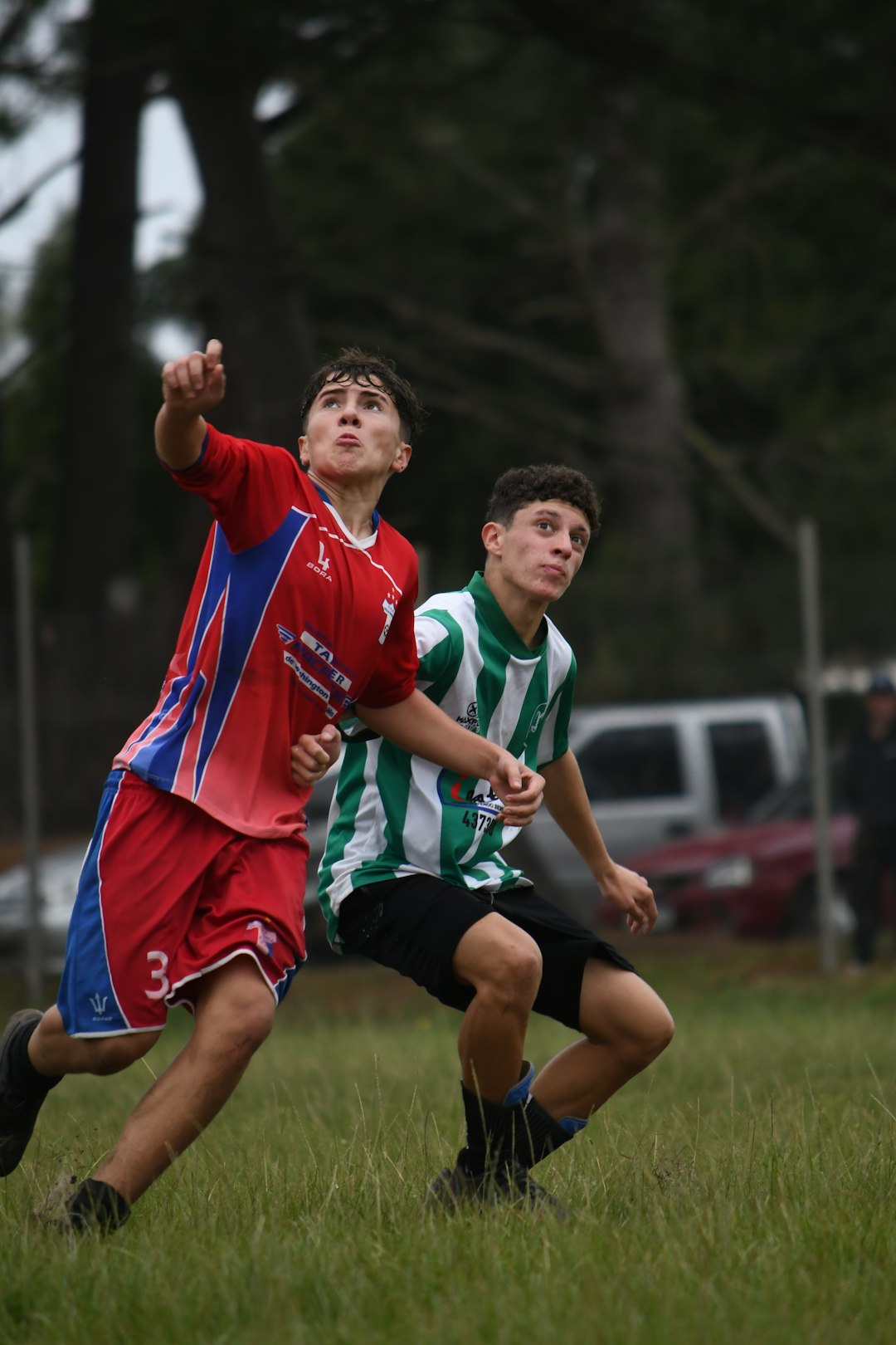 gallery-6 a-couple-of-young-men-playing-a-game-of-soccer-kmuzd4artju