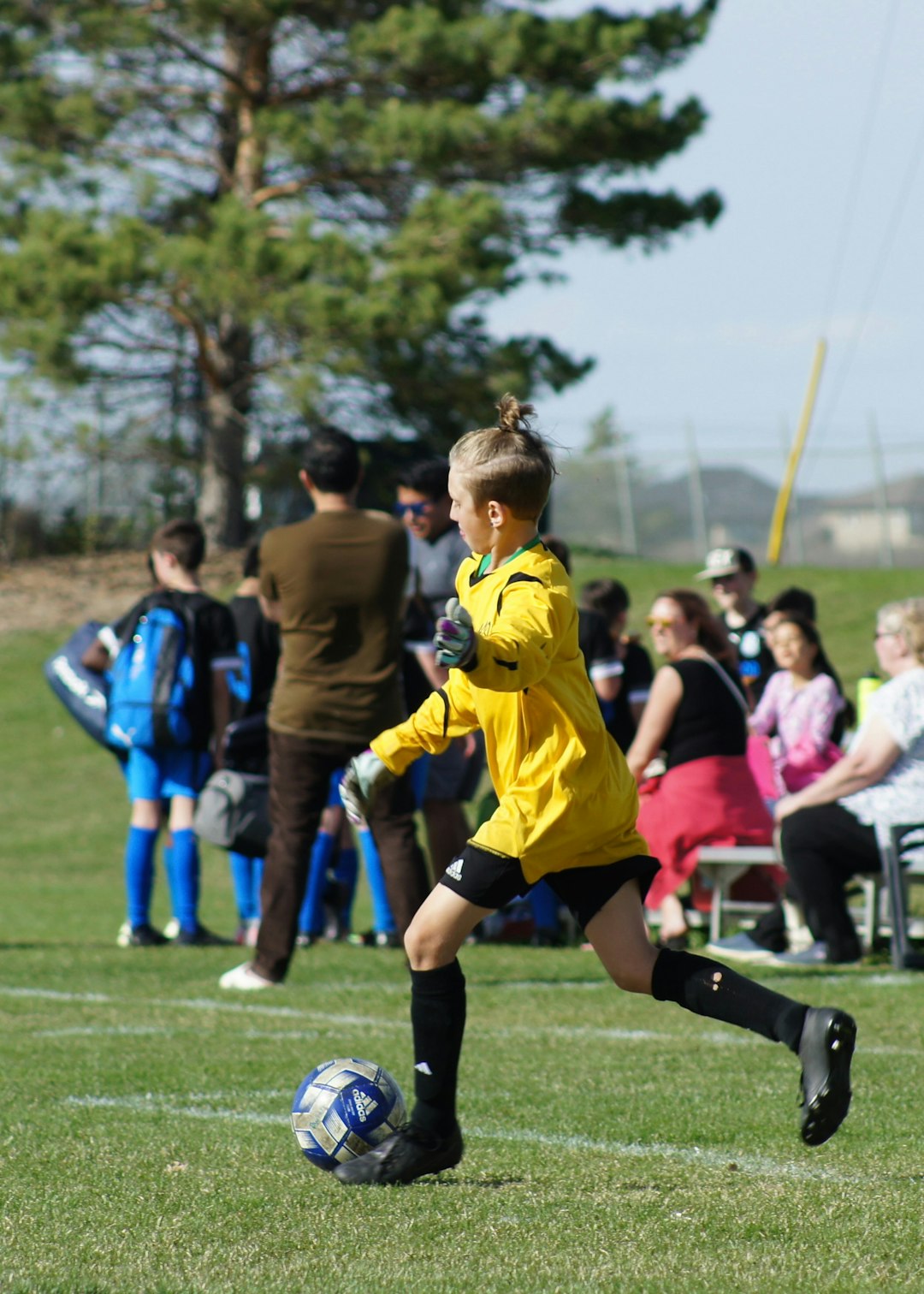 Crafting Captivating Headlines: Your awesome post title goes here a-young-girl-kicking-a-soccer-ball-on-a-field-xbjp29gike